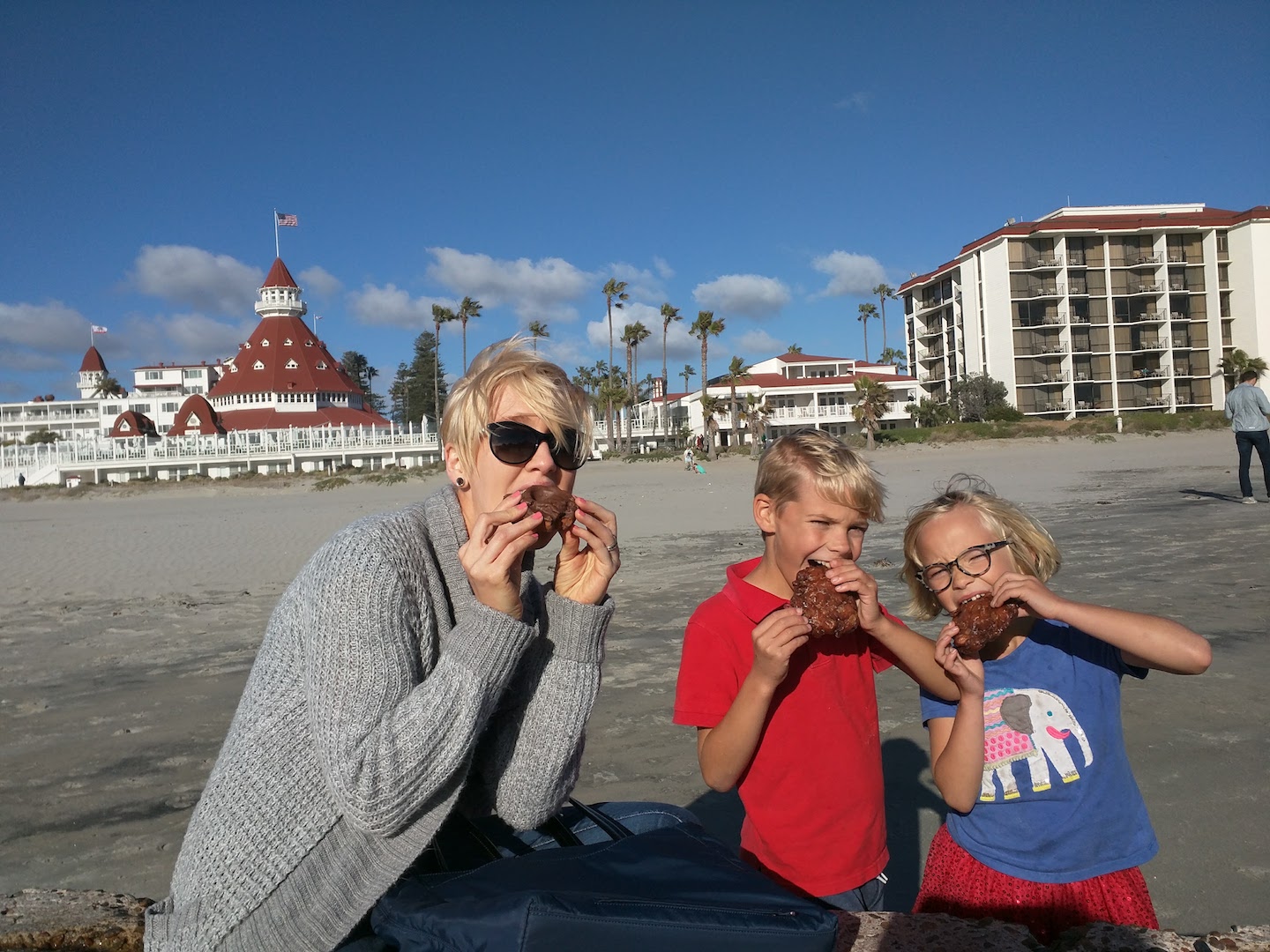 Eating Apple Fritter Donuts on Coronado Beach in San Diego, CA