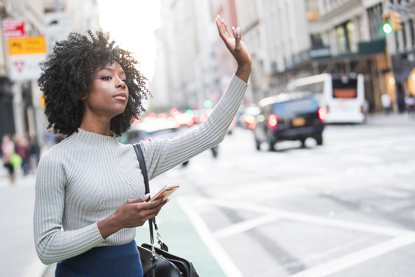 Woman Hailing Ride-Sharing App Driver