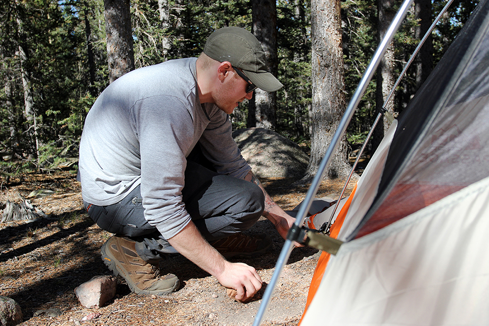 Staking Tent at Pike National Forest Outside Barr Camp