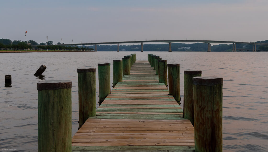 Green Wooden Dock Facing Hill Bridge on the United States Naval Academy Yard in Annapolis, Maryland