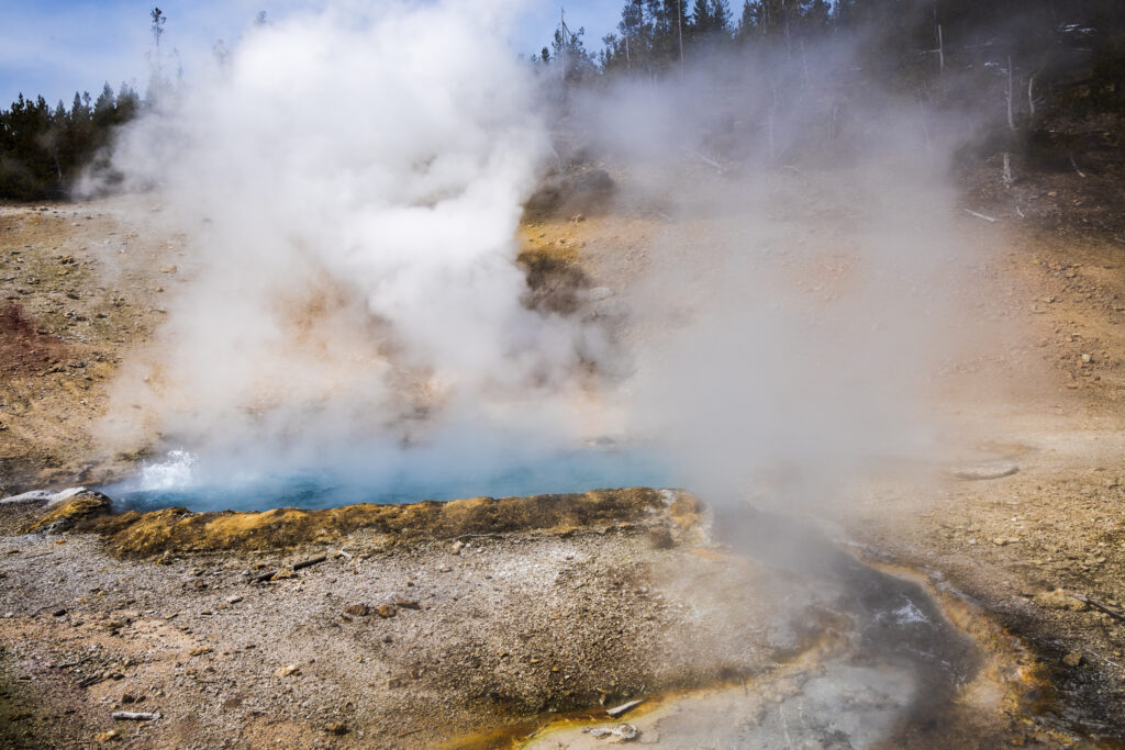 Steaming Beryl Hot Spring at Yellowstone National Park