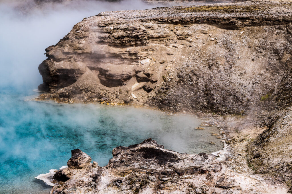 Steaming Hot Springs with Crystal Clear Turquoise Water at Yellowstone National Park