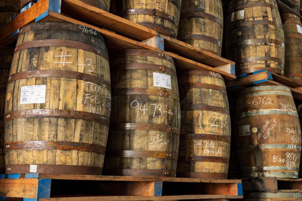 Stack of rum barrels; rum barrel marking system at Mount Gay Rum Distillery - photo by Heather Physioc