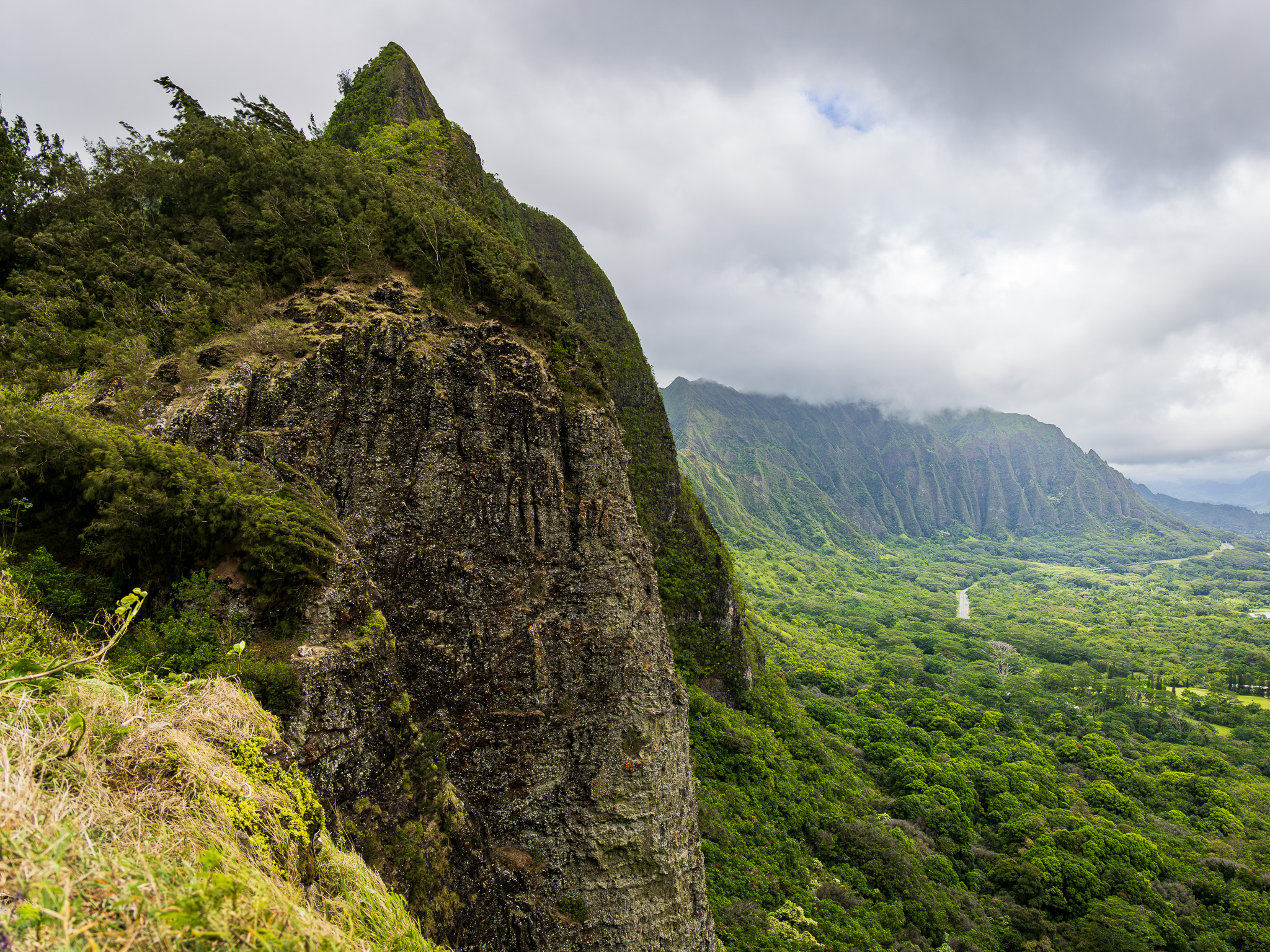 View from Nu'uanu Pali Lookout on a cloudy, rainy, windy afternoon in September