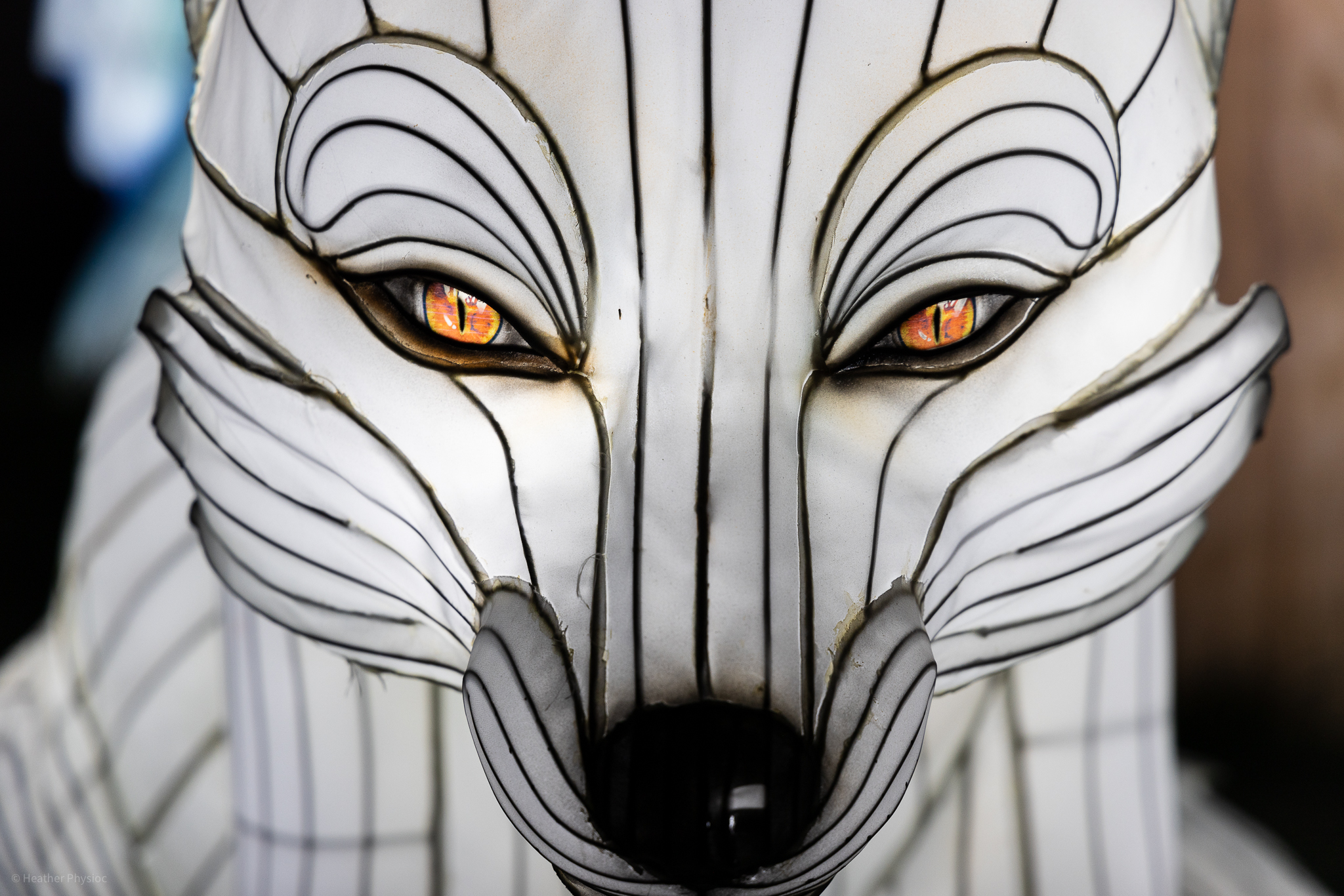 Wolf illuminated silk and steel lantern sculpture at 2023 GloWild event at the Kansas City Zoo & Aquarium