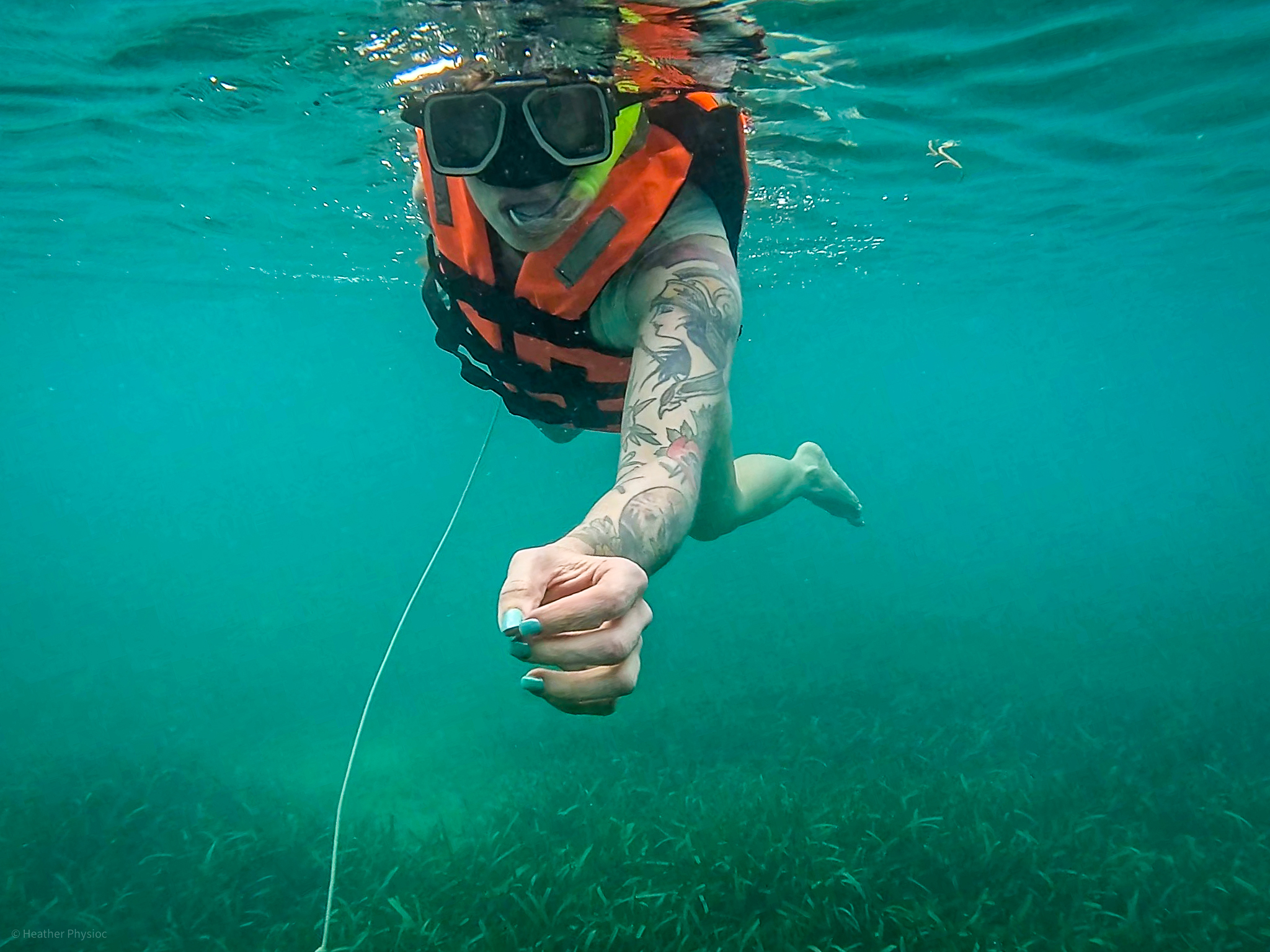 Conservation writer Heather Physioc snorkeling in the Akumal Bay in Yucatan, Mexico